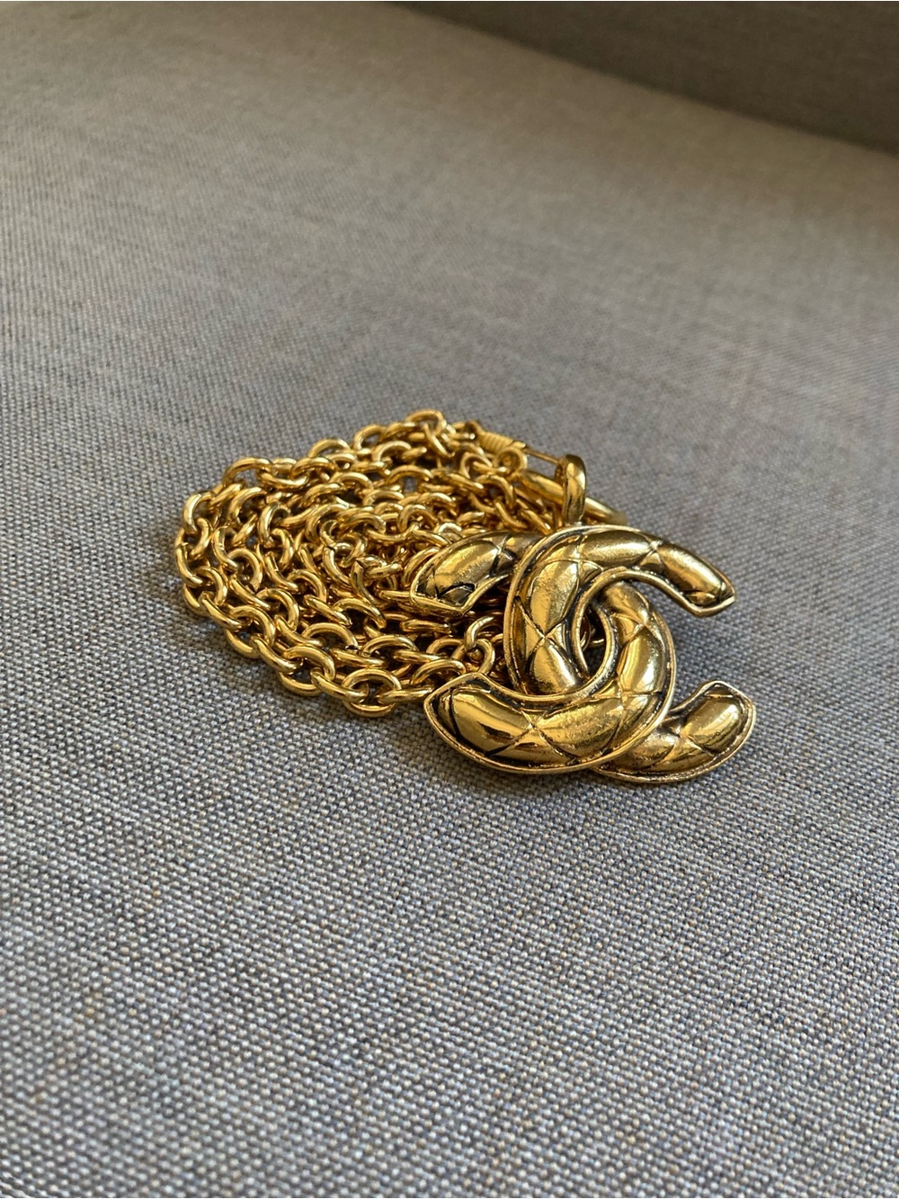 CHANEL Gold Quilted CC Pendant Necklace
